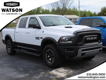 2016 RAM 1500 Rebel in a Bright_White_Clearco exterior color. Watson Benzie, LLC 231-383-7836 watsonchryslerdodgejeep.com 