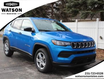 2024 Jeep Compass Sport 4x4 in a Laser Blue Pearl Coat exterior color. Watson Ludington Chrysler 231-239-6355 