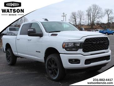 2024 RAM 2500 Big Horn Crew Cab 4x4 6'4' Box in a Bright White Clear Coat exterior color and Blackinterior. Watson Benzie, LLC 231-383-7836 watsonchryslerdodgejeep.com 
