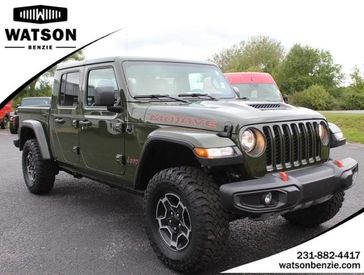 2022 Jeep Gladiator Mojave in a Sarge Green Clear Coat exterior color and Blackinterior. Watson Benzie, LLC 231-383-7836 watsonchryslerdodgejeep.com 