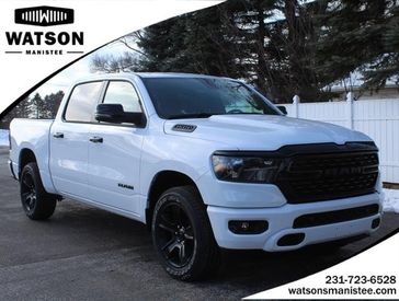 2024 RAM 1500 Big Horn Crew Cab 4x4 5'7' Box in a Bright White Clear Coat exterior color. Watson's Manistee Chrysler Inc 231-299-8691 watsonsmanisteechrysler.com 