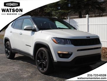 2021 Jeep Compass Altitude in a WHITE exterior color. Watson's Manistee Chrysler Inc 231-299-8691 watsonsmanisteechrysler.com 
