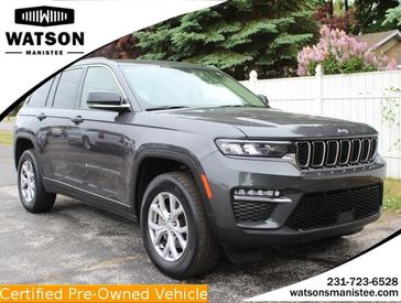 2022 Jeep Grand Cherokee Limited in a Baltic Gray Metallic Clear Coat exterior color and Wicker Beige/Blackinterior. Watson's Manistee Chrysler Inc 231-299-8691 watsonsmanisteechrysler.com 