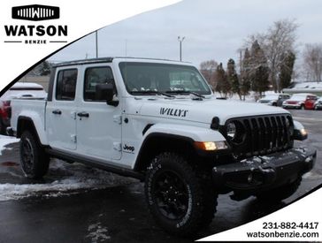 2023 Jeep Gladiator Willys 4x4 in a Bright White Clear Coat exterior color and Blackinterior. Watson Ludington Chrysler 231-239-6355 