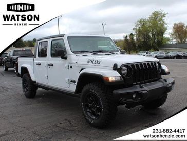 2023 Jeep Gladiator Willys 4x4 in a Bright White Clear Coat exterior color and Blackinterior. Watson's Manistee Chrysler Inc 231-299-8691 watsonsmanisteechrysler.com 