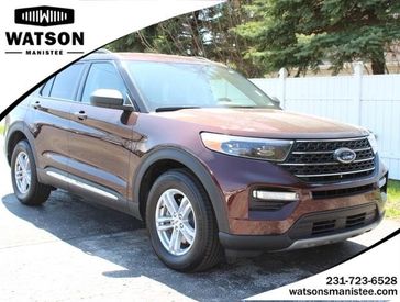 2020 Ford Explorer XLT in a Rich Copper Metallic Tinted Clear Coat exterior color and Sandstoneinterior. Watson Ludington Chrysler 231-239-6355 