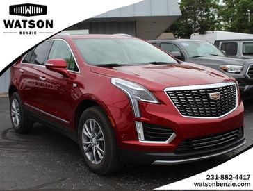 2023 Cadillac XT5 FWD Premium Luxury in a Radiant Red Tint Coat exterior color and Cirrusinterior. Watson Ludington Chrysler 231-239-6355 