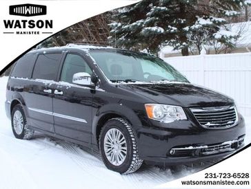 2016 Chrysler Town & Country Touring-L in a BLACK exterior color and Dk Frost Beige/Med Beigeinterior. Watson's Manistee Chrysler Inc 231-299-8691 watsonsmanisteechrysler.com 