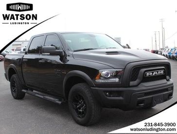2021 RAM 1500 Classic Warlock in a BLACK exterior color and Blackinterior. Watson Ludington Chrysler 231-239-6355 