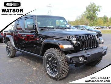 2023 Jeep Gladiator Willys 4x4 in a Black Clear Coat exterior color and Blackinterior. Watson's Manistee Chrysler Inc 231-299-8691 watsonsmanisteechrysler.com 