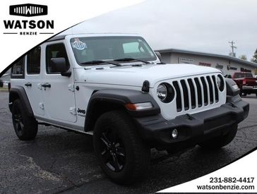 2021 Jeep Wrangler Unlimited Sport Altitude in a BRIGHT-WHI exterior color and Blackinterior. Watson's Manistee Chrysler Inc 231-299-8691 watsonsmanisteechrysler.com 