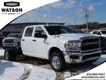 2024 RAM 3500 Tradesman Crew Cab Chassis 4x4 60' Ca in a Bright White Clear Coat exterior color and Diesel Gray/Blackinterior. Watson's Manistee Chrysler Inc 231-299-8691 watsonsmanisteechrysler.com 