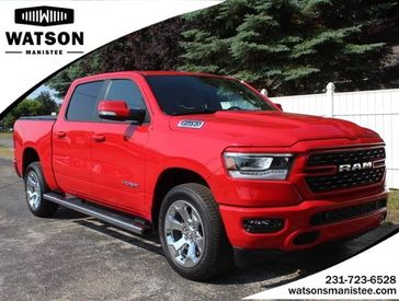 2022 RAM 1500 Big Horn in a Flame Red Clear Coat exterior color and Diesel Gray/Blackinterior. Watson Ludington Chrysler 231-239-6355 