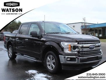 2018 Ford F-150 XL in a Magma Red Metallic exterior color and Dark Earth Grayinterior. Watson Auto 000-000-0000 