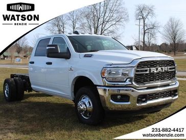 2024 RAM 3500 Tradesman Crew Cab Chassis 4x4 60' Ca in a Bright White Clear Coat exterior color and Diesel Gray/Blackinterior. Watson's Manistee Chrysler Inc 231-299-8691 watsonsmanisteechrysler.com 