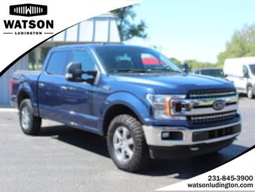2018 Ford F-150 XLT in a Blue Jeans Metallic exterior color and Medium Earth Grayinterior. Watson Benzie, LLC 231-383-7836 watsonchryslerdodgejeep.com 