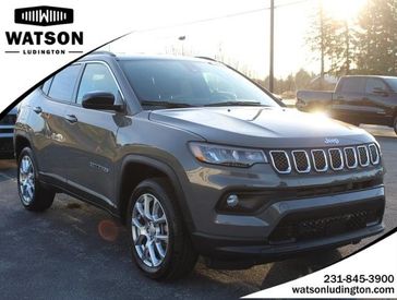 2024 Jeep Compass Latitude Lux 4x4 in a Sting-Gray Clear Coat exterior color and Blackinterior. Watson Ludington Chrysler 231-239-6355 