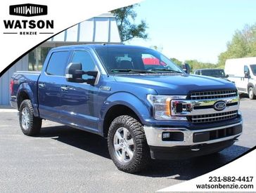 2018 Ford F-150 XLT in a Blue Jeans Metallic exterior color and Medium Earth Grayinterior. Watson Ludington Chrysler 231-239-6355 