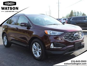 2020 Ford Edge SEL in a Burgundy Velvet Metallic Tinted Clear Coat exterior color and Ebonyinterior. Watson Auto 000-000-0000 