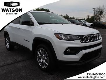 2022 Jeep Compass Latitude Lux in a BRIGHT-WHI exterior color and Blackinterior. Watson's Manistee Chrysler Inc 231-299-8691 watsonsmanisteechrysler.com 