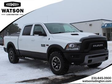 2016 RAM 1500 Rebel in a Bright_White_Clearco exterior color. Watson Ludington Chrysler 231-239-6355 