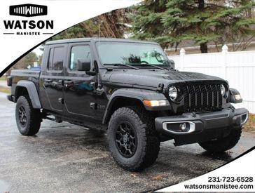 2023 Jeep Gladiator Sport S 4x4 in a Black Clear Coat exterior color and Blackinterior. Watson's Manistee Chrysler Inc 231-299-8691 watsonsmanisteechrysler.com 