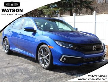 2020 Honda Civic EX-L in a BLUE exterior color and Blackinterior. Watson Benzie, LLC 231-383-7836 watsonchryslerdodgejeep.com 