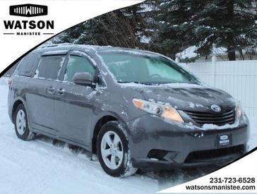 2015 Toyota Sienna LE AAS in a Predawn Gray Mica exterior color and Ashinterior. Watson's Manistee Chrysler Inc 231-299-8691 watsonsmanisteechrysler.com 