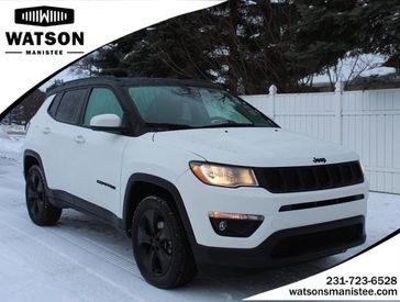 2021 Jeep Compass Altitude in a WHITE exterior color. Watson's Manistee Chrysler Inc 231-299-8691 watsonsmanisteechrysler.com 