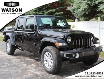 2023 Jeep Gladiator Sport S 4x4 in a Black Clear Coat exterior color and Blackinterior. Watson's Manistee Chrysler Inc 231-299-8691 watsonsmanisteechrysler.com 