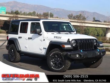 2023 Jeep Wrangler 4xE  in a BRIGHT WHITE exterior color. Glendora Chrysler Dodge Jeep Ram 909-506-2515 glendorachryslerjeepdodge.com 