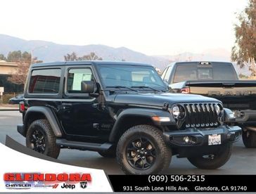 2021 Jeep Wrangler Willys Sport in a Black Clear Coat exterior color and Blackinterior. Glendora Chrysler Dodge Jeep Ram 909-506-2515 glendorachryslerjeepdodge.com 