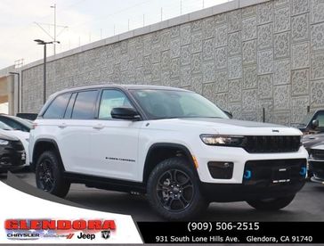 2024 Jeep Grand Cherokee Trailhawk 4xe in a Bright White Clear Coat exterior color. Glendora Chrysler Dodge Jeep Ram 909-506-2515 glendorachryslerjeepdodge.com 