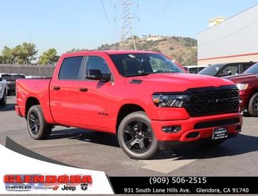 2024 RAM 1500 Big Horn Crew Cab 4x2 5'7' Box in a Flame Red Clear Coat exterior color. Glendora Chrysler Dodge Jeep Ram 909-506-2515 glendorachryslerjeepdodge.com 