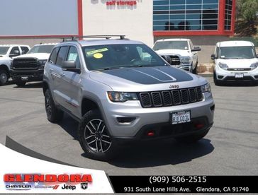 2019 Jeep Grand Cherokee Trailhawk in a BILLET SILVER exterior color. Glendora Chrysler Dodge Jeep Ram 909-506-2515 glendorachryslerjeepdodge.com 