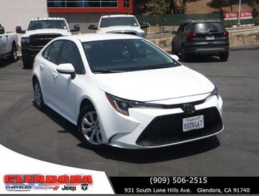 2022 Toyota Corolla LE in a WHITE exterior color. Glendora Chrysler Dodge Jeep Ram 909-506-2515 glendorachryslerjeepdodge.com 