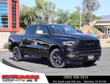 2024 RAM 1500 Limited Crew Cab 4x4 5'7' Box in a Diamond Black Crystal Pearl Coat exterior color. Glendora Chrysler Dodge Jeep Ram 909-506-2515 glendorachryslerjeepdodge.com 