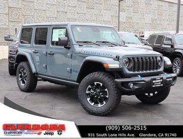 2024 Jeep Wrangler 4-door Rubicon X 4xe in a Anvil Clear Coat exterior color. Glendora Chrysler Dodge Jeep Ram 909-506-2515 glendorachryslerjeepdodge.com 