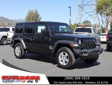 2020 Jeep Wrangler Unlimited Sport S in a Black Clear Coat exterior color and Blackinterior. Glendora Chrysler Dodge Jeep Ram 909-506-2515 glendorachryslerjeepdodge.com 