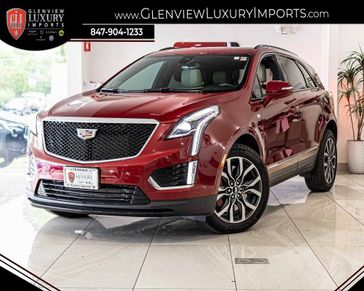 2023 Cadillac XT5 AWD Sport in a Red exterior color and Cirrusinterior. Glenview Luxury Imports 847-904-1233 glenviewluxuryimports.com 