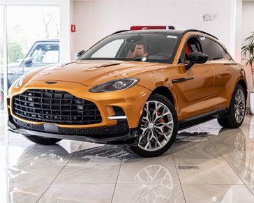 2023 Aston Martin DBX 707 in a GOLDEN SAFFRON exterior color. Glenview Luxury Imports 847-904-1233 glenviewluxuryimports.com 