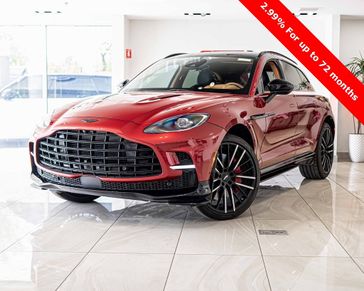 2023 Aston Martin DBX 707 in a Hyper Red exterior color and Oxford Taninterior. Lotus of Glenview 847-904-1233 lotusofglenview.com 