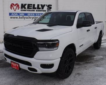 2024 RAM 1500 Laramie Crew Cab 4x4 5'7' Box in a Bright White Clear Coat exterior color. Kelly’s Chrysler Center 888-806-1140 pixelmotiondemo.com 