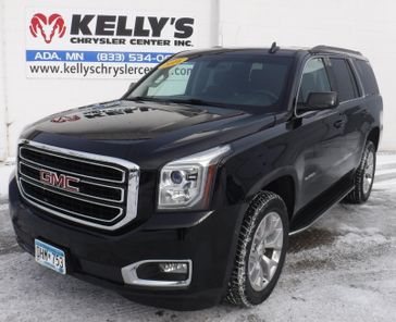 2016 GMC Yukon SLE in a BLACK exterior color. Kelly’s Chrysler Center 888-806-1140 pixelmotiondemo.com 
