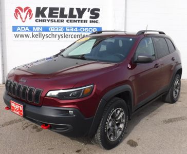2020 Jeep Cherokee Trailhawk in a VELVET RED exterior color. Kelly’s Chrysler Center 888-806-1140 pixelmotiondemo.com 