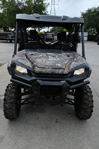 NEW 2025 HONDA PIONEER 10006 DELUXE CREW  in a TRUETIMBER ATERA CAMO exterior color. Family PowerSports (877) 886-1997 familypowersports.com 