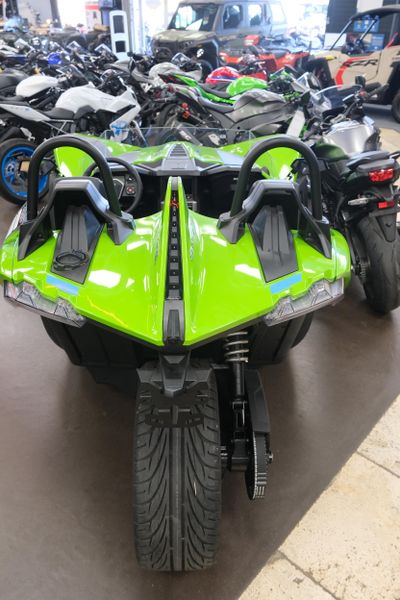NEW 2025 POLARIS SLINGSHOT SL MANUAL  in a LIQUID LIME exterior color. Family PowerSports (877) 886-1997 familypowersports.com 