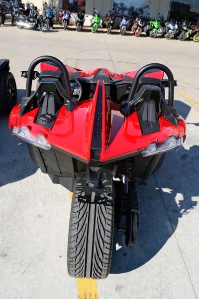 NEW 2025 POLARIS SLINGSHOT S AUTODRIVE  in a SLINGSHOT RED exterior color. Family PowerSports (877) 886-1997 familypowersports.com 