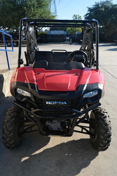 NEW 2026 HONDA PIONEER 7004  in a HERO RED exterior color. Family PowerSports (877) 886-1997 familypowersports.com