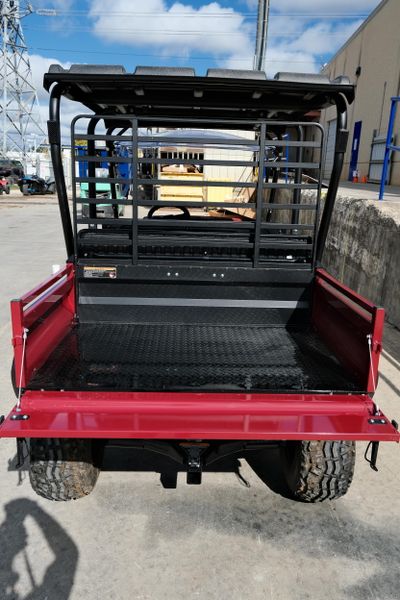NEW 2026 KAWASAKI MULE 4010 TRANS4X4  in a DARK ROYAL RED exterior color. Family PowerSports (877) 886-1997 familypowersports.com 